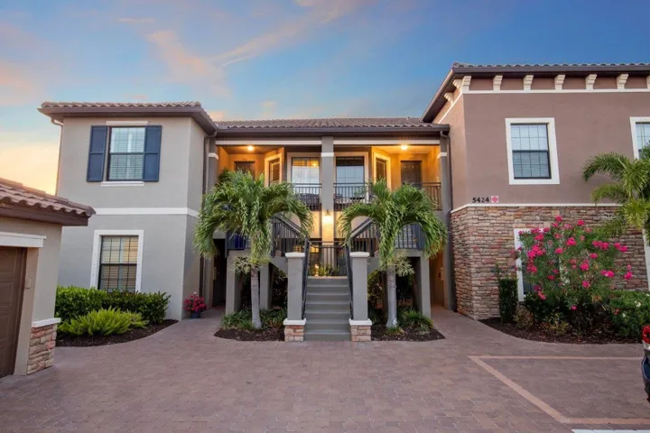 Front Exposure showing one car garage and private parking