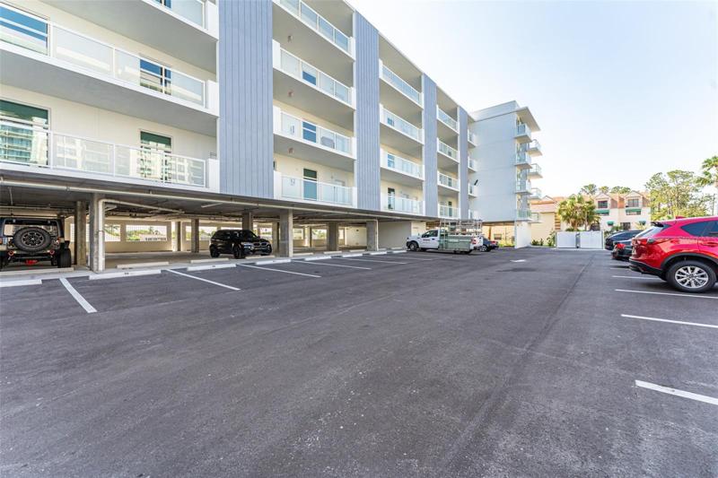 Outdoor parking spot and one covered spot