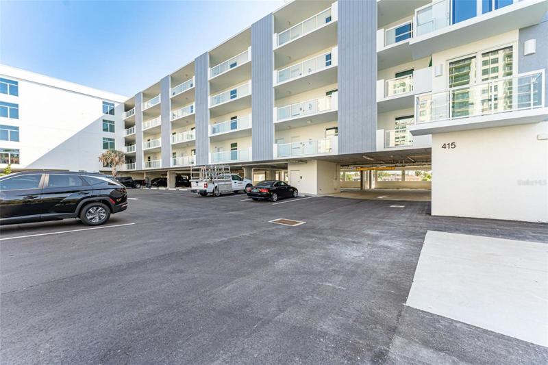 Outdoor parking spot and one covered spot