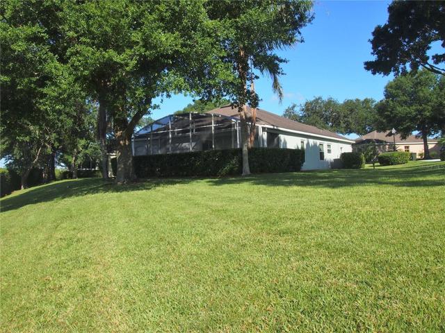 Back view of  home and yard