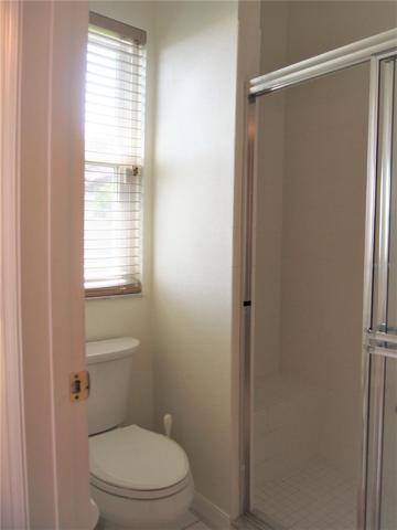Master Bath private toilet & walk in tub