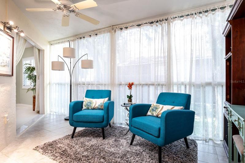 BRIGHT BONUS space with landscaped views, has vinyl windows (screened too) and is perfect for many uses. Office area, craft space, sitting or reading area.