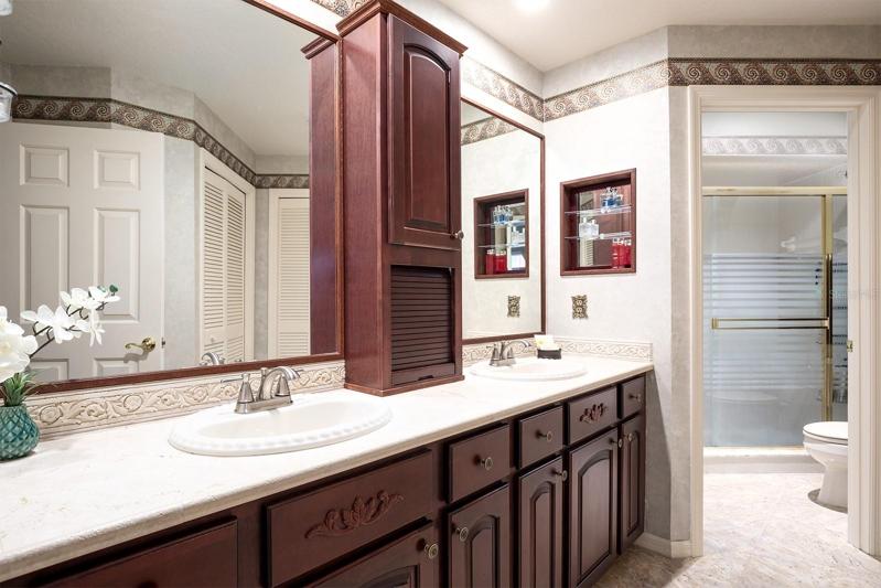 Rich color selections and finishes add to this classic bathroom space.