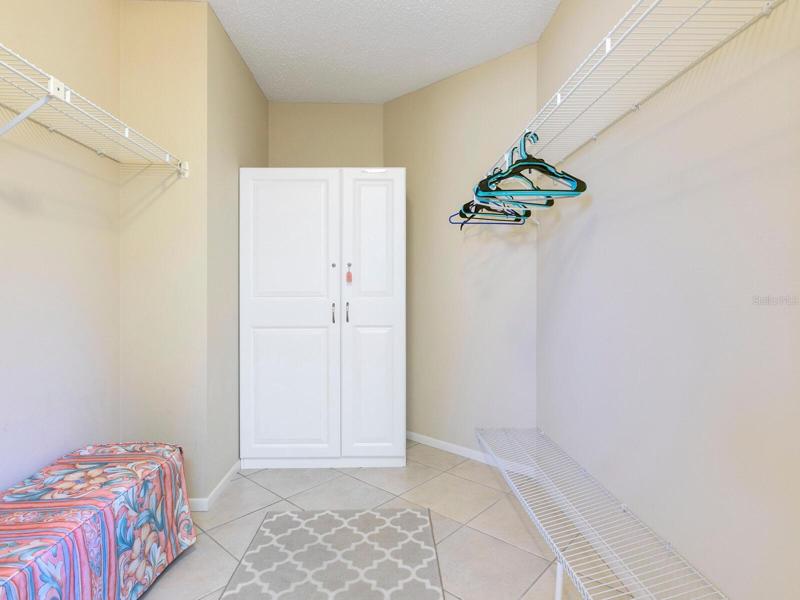 Bedroom 1 walk-in closet and lockable owner's cabinet