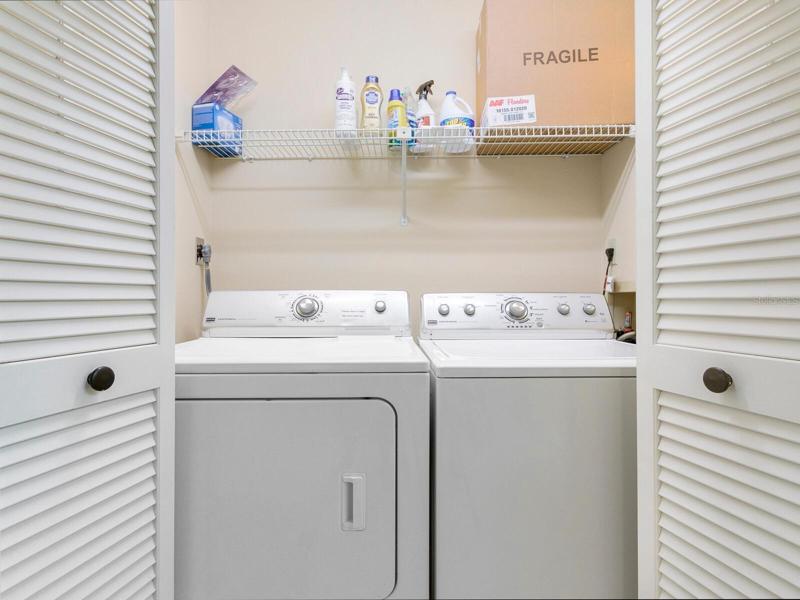 Laundry with storage shelf. Clean as a whistle!