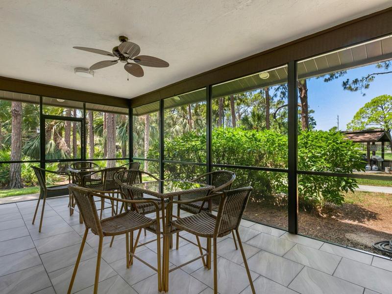 Club house lanai overlooks bbq and picnic area
