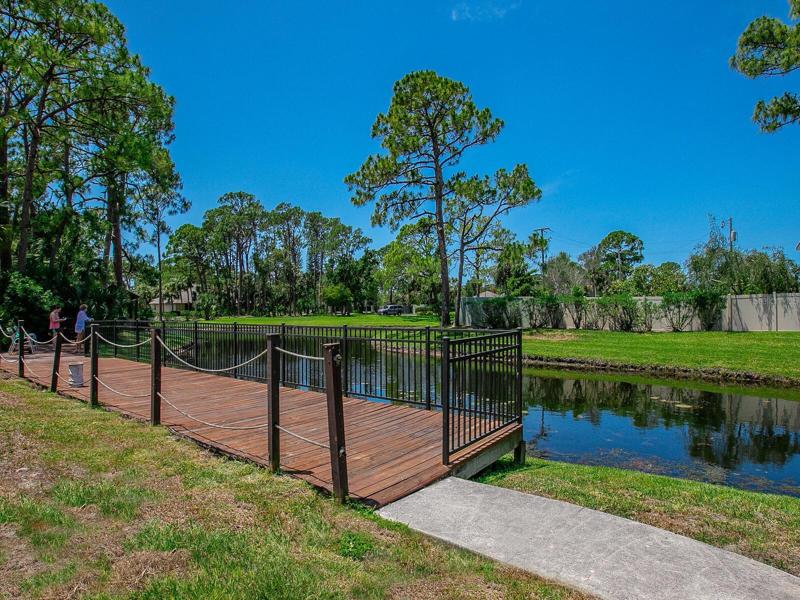 Sun deck by the pond in Village des Pins