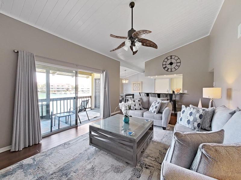 The family is open to the kitchen and balcony!