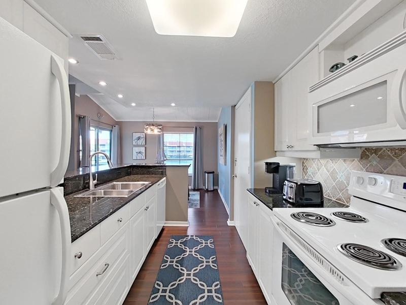 Galley kitchen with all the amenities and gadgets!