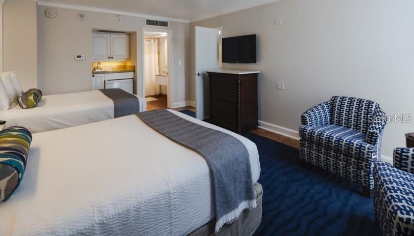 2 comfy full beds in bedroom 2 with attached bathroom