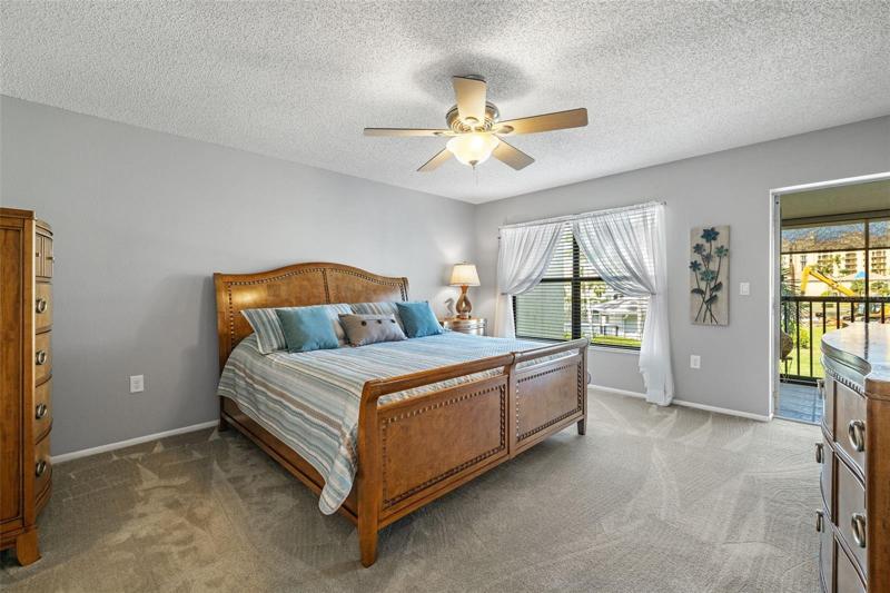 Master Bedroom with door leading out to the lanai.