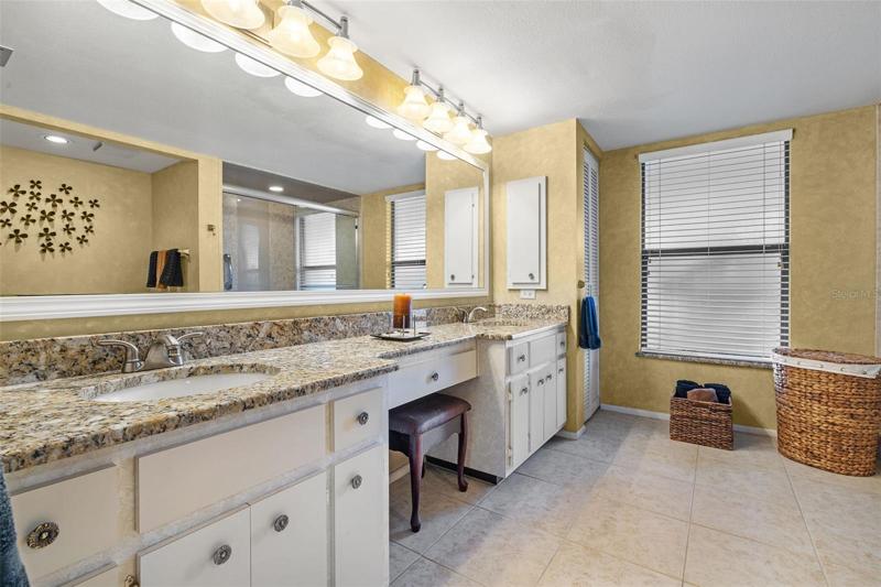 Master Bathroom - tile flooring, granite countertop, glass door on shower.