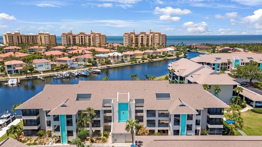 Condo is on 2nd Floor, End Unit, on right side of Building. See Arrow