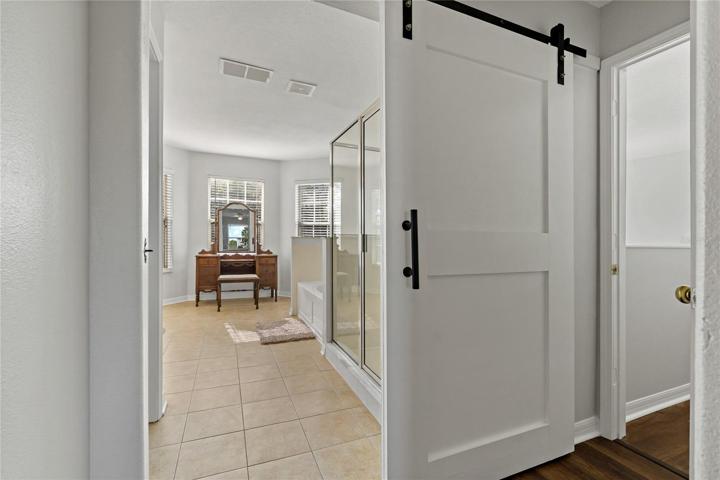 Owner's Bathroom with Custom Barn Door