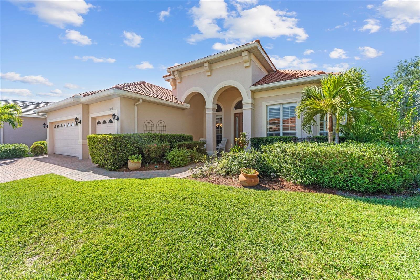 Lovely Mediterranean style home with 3-car garage, large corner lot