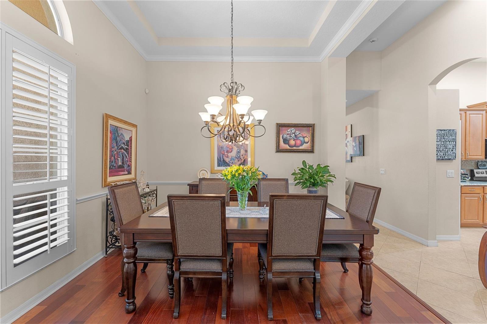 Formal dining room, hallway to master suite and kitchen entrance