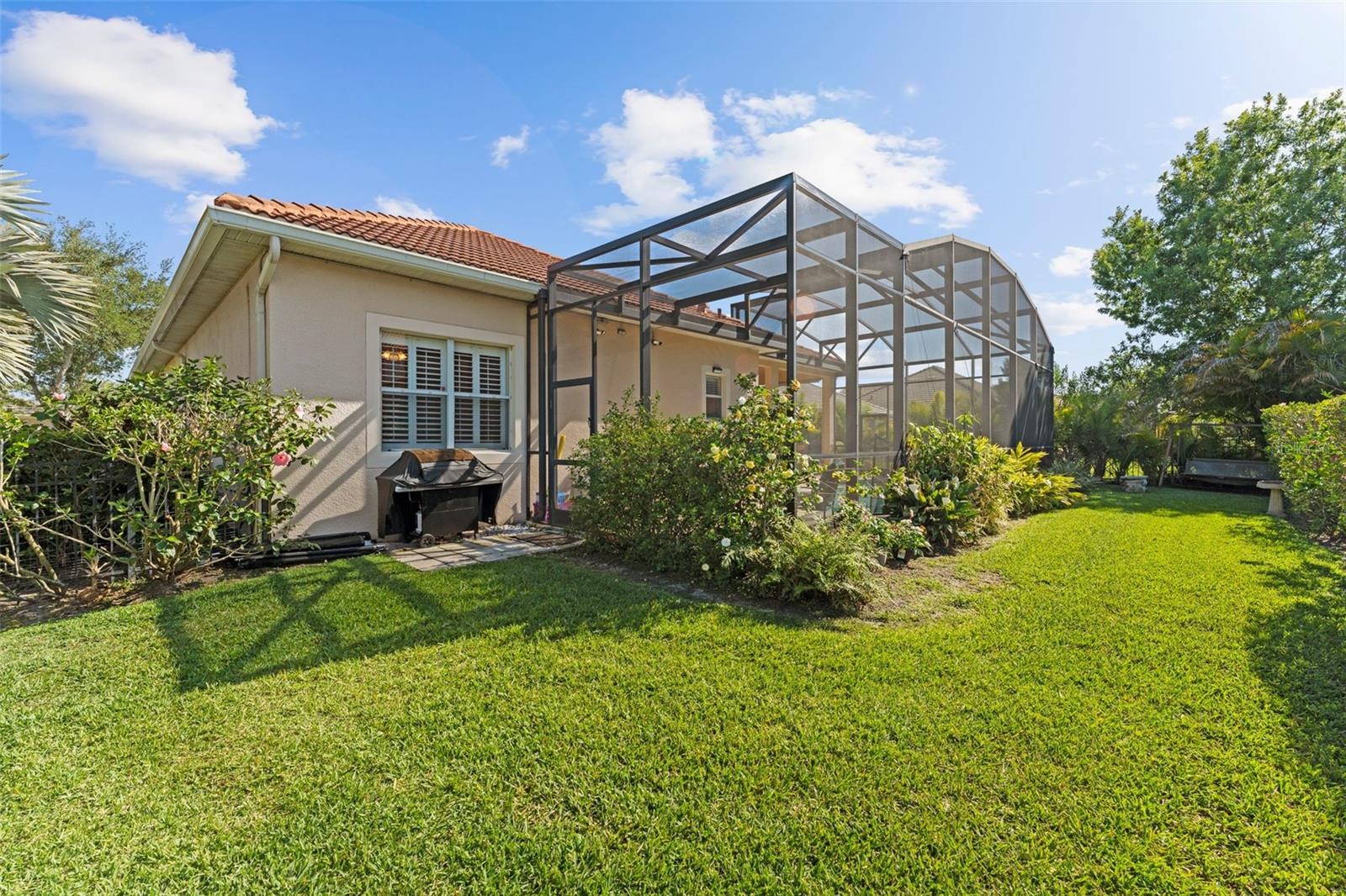 completely fenced in and spacious backyard oasis