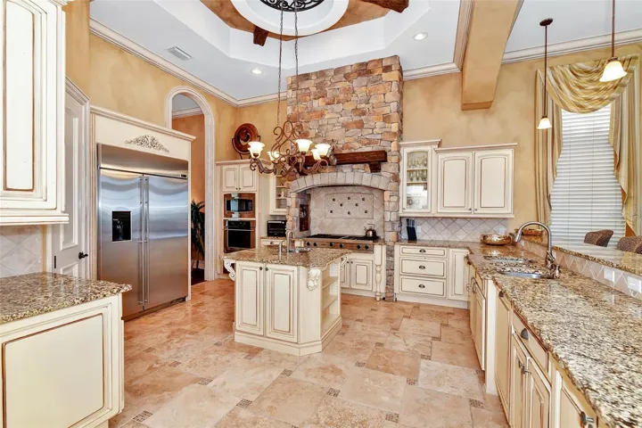 Spacious Chefs Kitchen with Professional Viking Gas Stove and Stunning Cabinetry