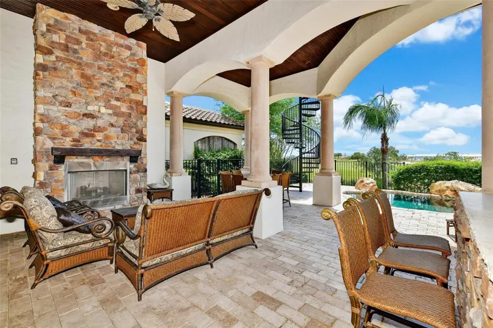 Wow! Poolside fireplace and Luxury Patio Furniture