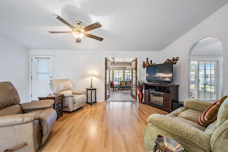 Warm wood laminate floors greet you!