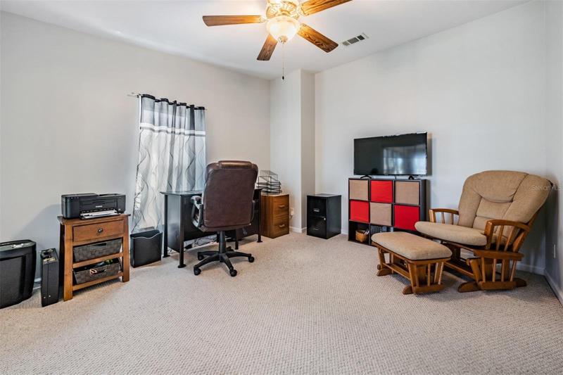 French doors to the Flex room being used as a DEN/Office off the Great room