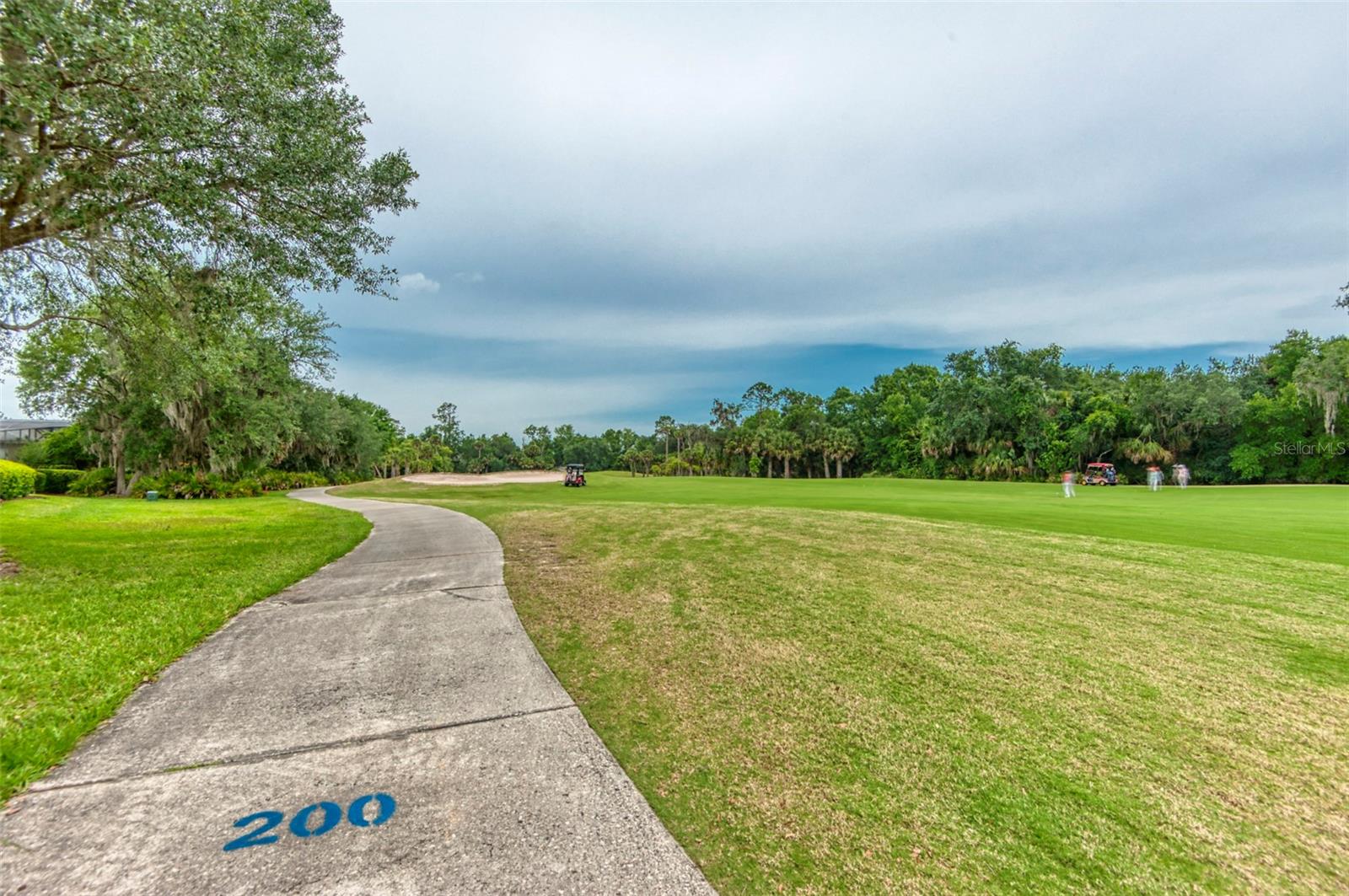 this home is approximately 200 yards from the tee. 4th green for the Oaks course in the distance