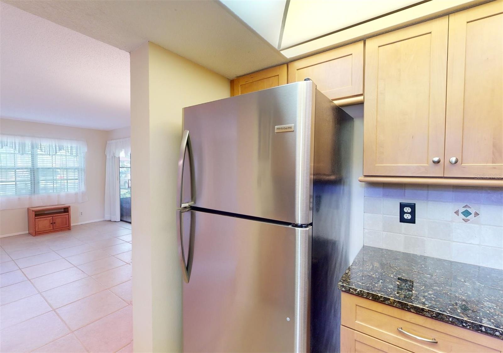 Kitchen, stainless refrigerator.
