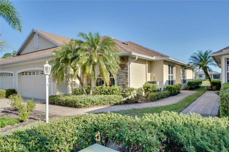 Beautifully landscaped Carriage Home