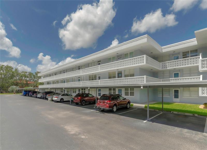 Exterior Front of Building - Reserved Covered Parking Space #38