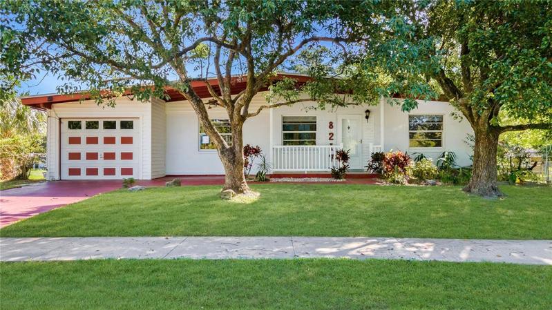 Gorgeous & JUST RENOVATED Three-Bedroom, Two-Bath, Concrete-Block, Single-Family Home with both a One-Car Attached GARAGE AND a Bonus Detached One-Garage or WORKSHOP in the Rear! HOLY COW!