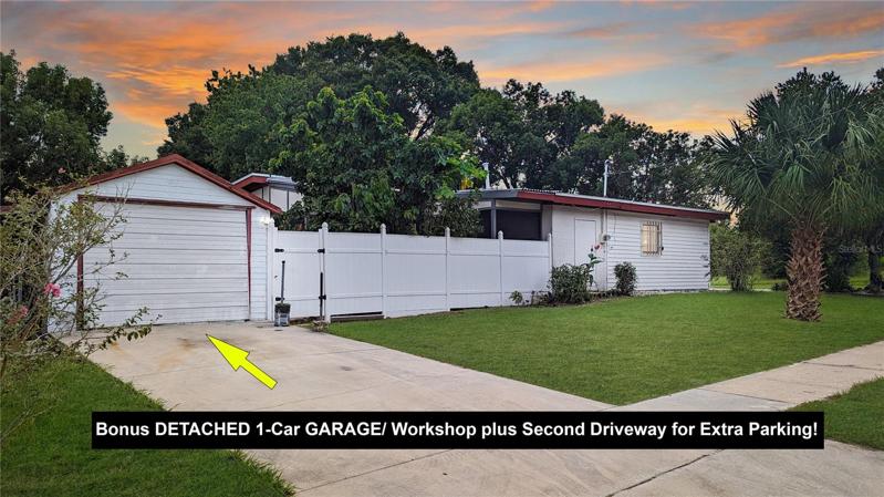 Detached Bonus GARAGE/WORKSHOP with Long Extra Driveway Will be Perfect For Anyone Looking for a Place to Park a WORK VEHICLE, Park a BOAT or Jet ski, or to Work on any Type of Vehicles or Machines, do Wood-Working… or for Extra Storage for Your Business!