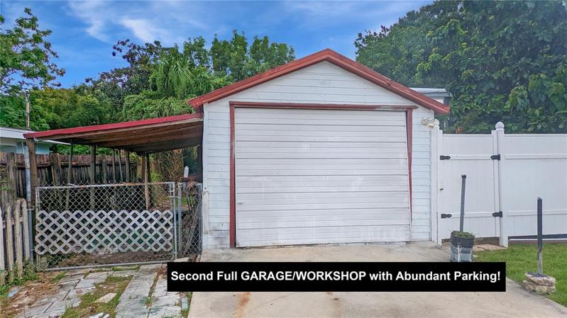 Detached Bonus GARAGE/WORKSHOP with Long Extra Driveway Will be Perfect For Anyone Looking for a Place to Park a WORK VEHICLE, Park a BOAT or Jet ski, or to Work on any Type of Vehicles or Machines, do Wood-Working… or for Extra Storage for Your Business!