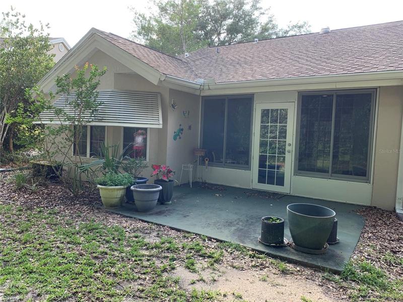 Back of Villa with patio to enjoy BBQ or gardening