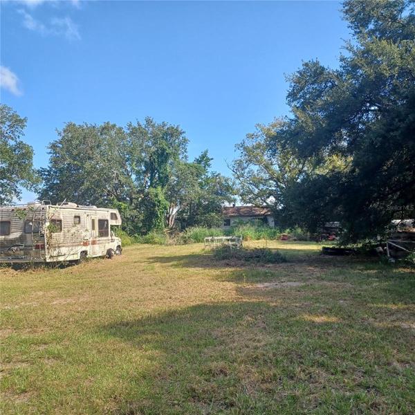 Back facing house on side