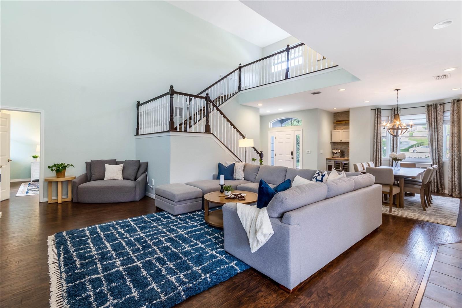 The Primary Bedroom is located through the Living Room