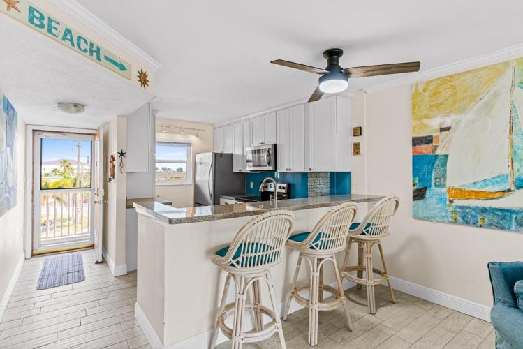 Kitchen featuring with natural lighting