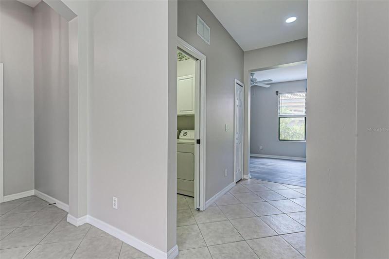 HALLWAY TO LAUNDRYROOM AND BEDROOM