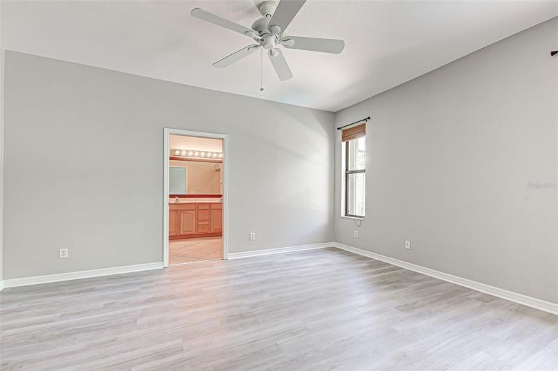PRIMARY BEDROOM LOOK IN TO BATHROOM