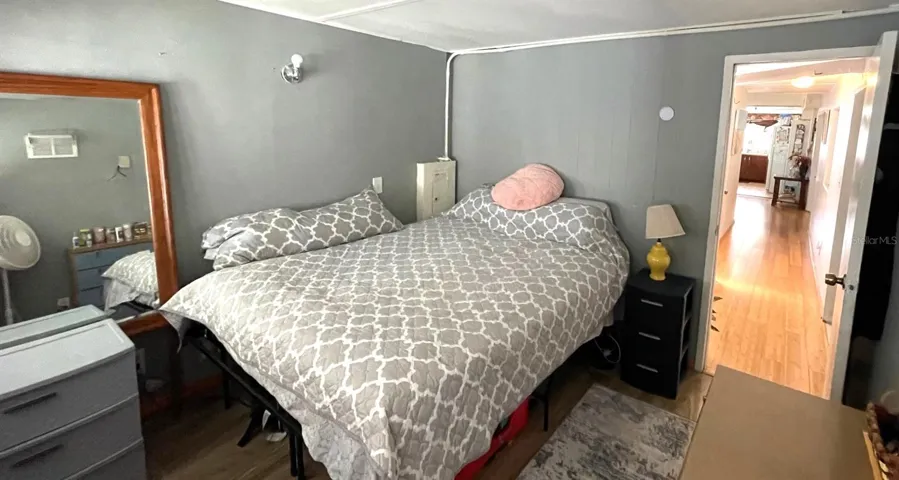 View of this bedroom looking down the hallway.