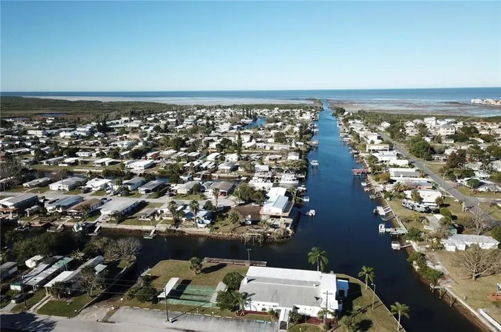 This is the  main canal out. The Signal Cove Club house  Cove Clubhouse is located at the bottom / East end.