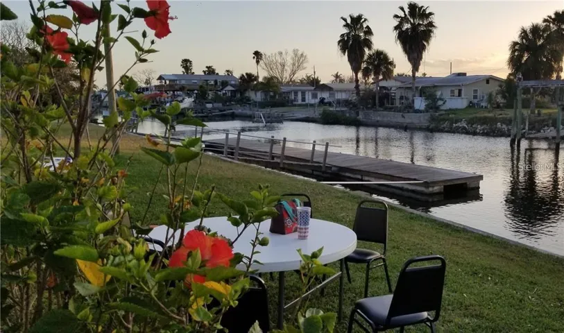 Back of the clubhouse. Has a large floating dock for coming via boat.