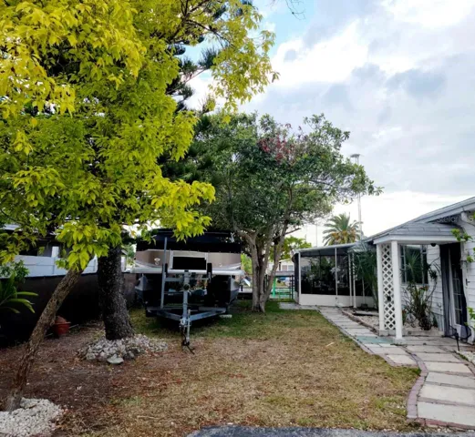 Side of the yard looking from street to canal.