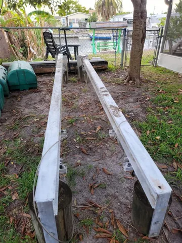 Parts for a boat lift are conveyed with the home.