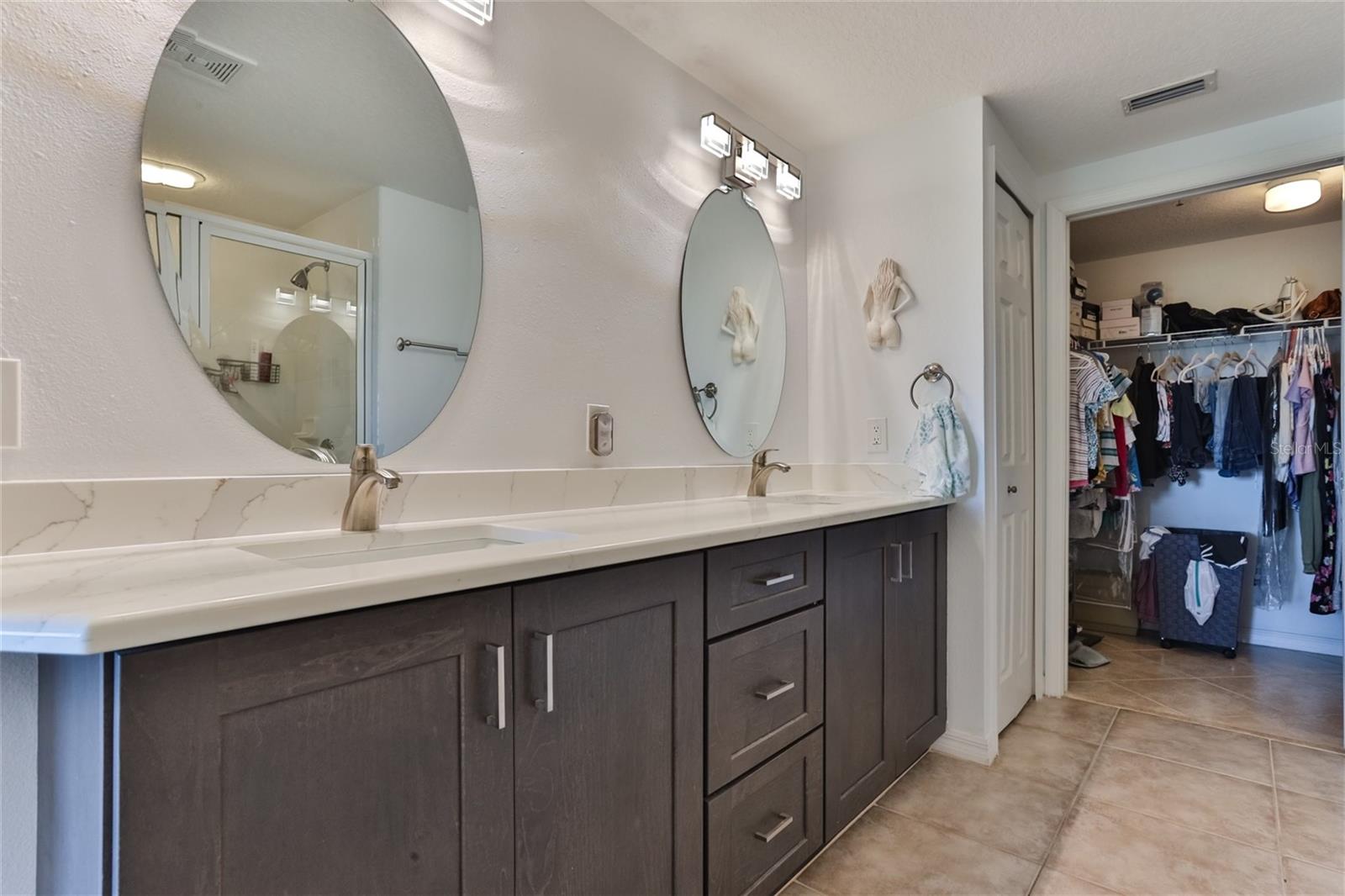 Master bathroom with large dual sink vanity and plenty of storage