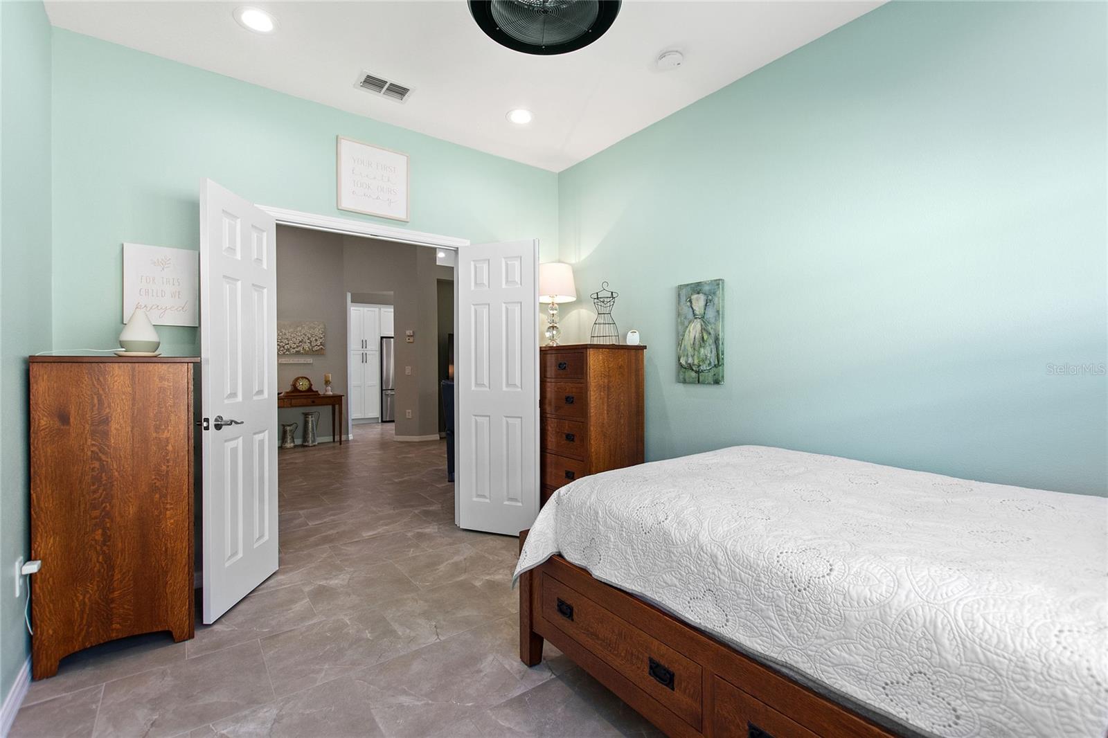 Double door access to bedroom 2