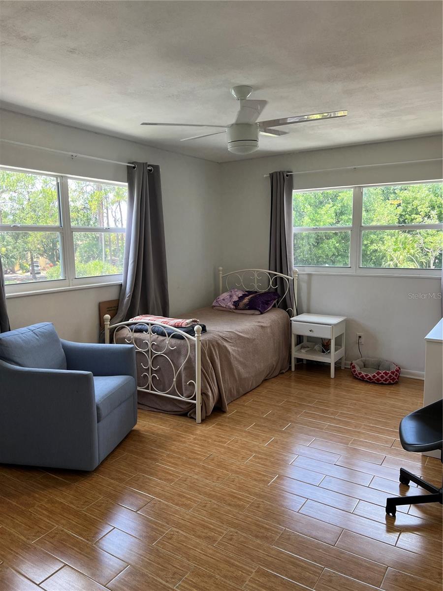 Bedroom #2 with corner windows.