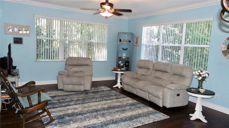 Living room view.  Crown molding throughout most of the home.