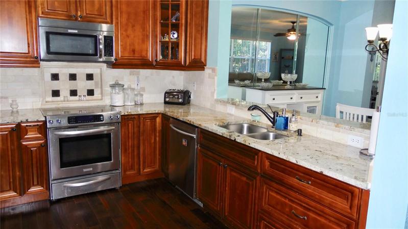 Kitchen area with stainless steel appliances