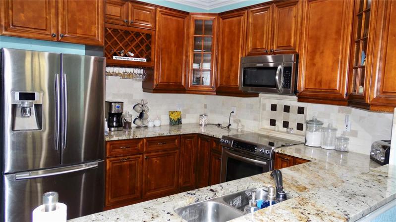 Another view of kitchen with solid wood cabinets