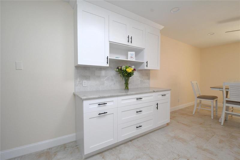 Kitchen - granite countertops and custom backsplash.
